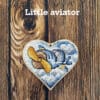 Little aviator on wood